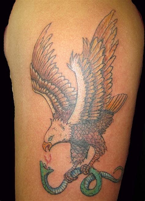 eagle with snake tattoo meaning